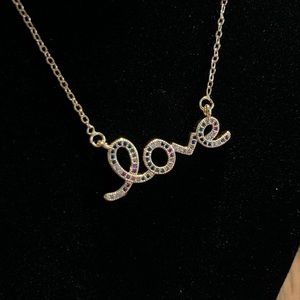 Gold necklace multicolor stones